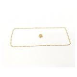 1.6g 14k yg fly pin; 9.5g 14k yg figaro link