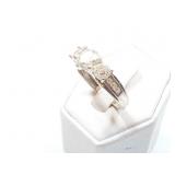 5.7g 14k wg ring with 3 clear stones;