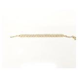 32.6g 14k yg bracelet with several diamond chips;
