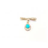 5.5g 14k yg pin with several diamond chips and 1