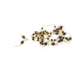 approx 7g 14k yg necklace with several black