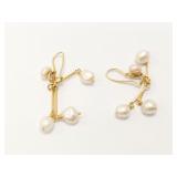 5.4g 14k yg pr earrings with white beads;