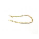 12.3g 14k yg tennis bracelet with several diamond
