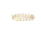 10.4g 14k yg bracelet with several white beads;