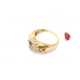 4.6g 10k yg ring with red center stone removed;