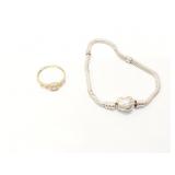 1.4g 14k yg ring with 5 clear chips; 12.8g .925
