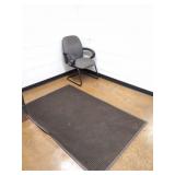 CHAIR AND HEAVY RUBBER RUG