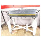 4 FOOT METAL BRAKE-ON HEAVY WHEELED CART- VERY