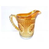 CARNIVAL GLASS PITCHER- APPROXIMATELY 6 INCHES