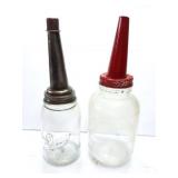 2 JARS WITH OIL SPOUT TOPS