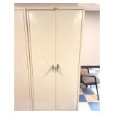 METAL CABINET- APPROXIMATELY 6 FOOT TALL