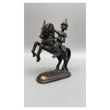 Antique oriental bronze sculpture of warrior on