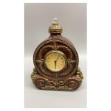 Antique wooden quartz clock 

7.75" x 5.5" x 2"