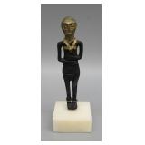 Antique miniature metal sculpture of a man on