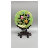 Chinese enamel painted green disc

13" x 8"