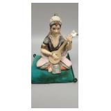 Antique hand painted porcelain sculpture of Arab