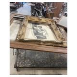STACK OF PICTURES AND FRAMES