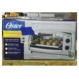 NEW OSTER STAINLESS STEEL TOASTER OVEN NEW OSTER STAINLESS STEEL TOASTER OVEN