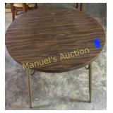 PREOWNED VINTAGE DINING TABLE WITH METAL LEGS