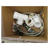 box of plumbing items