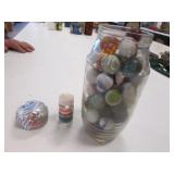 jar of shooter marbles,milk caps & hooks container