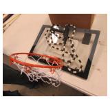 inside basketball goal & jump rope