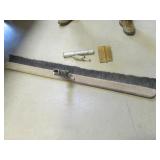 concrete broom & brass pointer