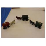3 cast iron horse carriers