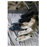 4 pairs of roller skates