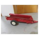 I.H. toy manure spreader