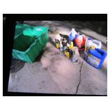 green tote & partial chemicals,2 jugs are full