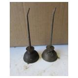 2 smaller oil cans