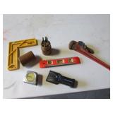 pipe wrench,level,stud sensor,punches,items