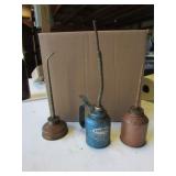 3 oil cans