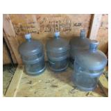 4 plastic water containers