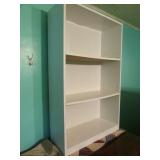 2 white bookshelves