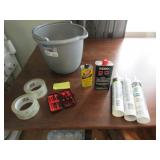 zippo fluid,2 packing rolls tape,bucket & items