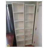 2 white cabinets