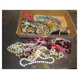 flat of costume jewelry