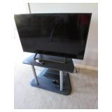 48" TV & stand (works)
