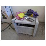 garden hose & items on top