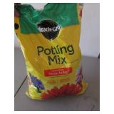 half bag of potting mix