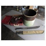 machetes,damaged crock & record player