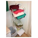 rack,towels,scales & trashcan