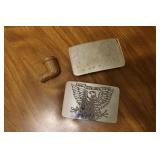 2 belt buckles & pipe