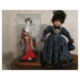 2 dolls incl;porcelain oriental doll w/case