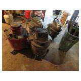 4 shop vacs & barrel w/hoses & items