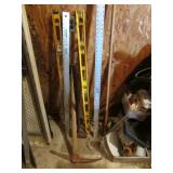 levels,measure sticks,pick axe,sledgehammer