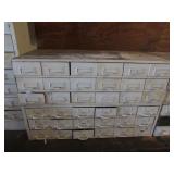 2 white metal organizers & all items inside