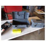 2 gray toolboxes w/some copper fittings inside